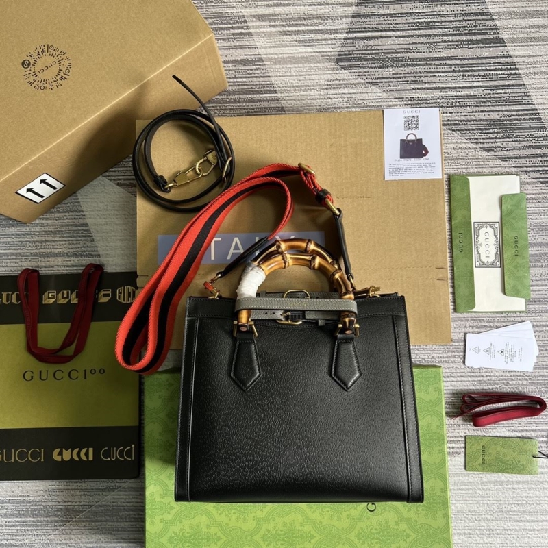 G*u*i top handle bags